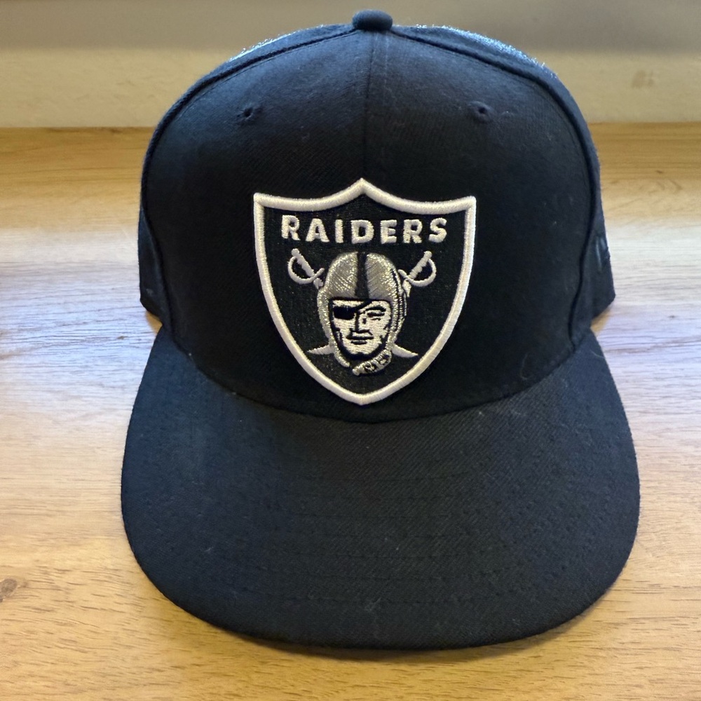New Era Black Raiders Hat